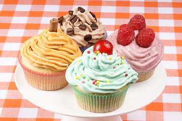 Image showing Assortment of fancy cupcakes