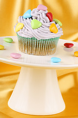 Image showing Cupcake with colorful sugar-coated hearts