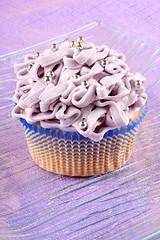 Image showing Fancy light purple cupcake