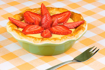 Image showing Strawberry and custard tart with dessert fork