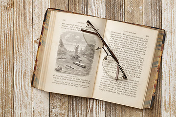 Image showing antique book on a grunge table