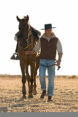 Image showing rider and his horse