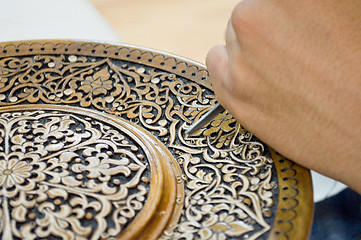 Image showing art of wood carving. 