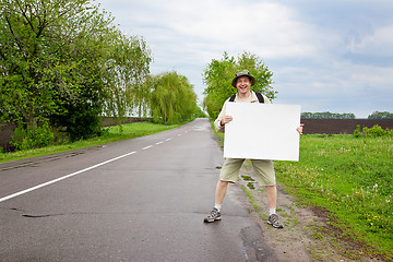 Image showing tourist on a country road