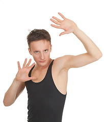 Image showing A young dancer in training, the portrait on a white background.