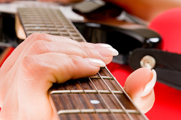 Image showing hands and fingers with a guitar 