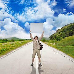 Image showing tourist on a country road