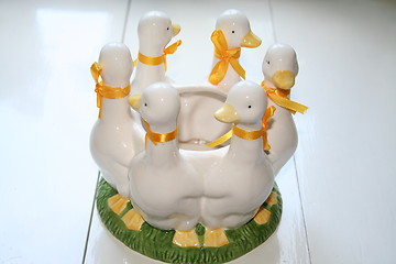 Image showing Ducks in white ceramics