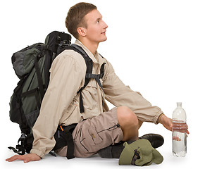 Image showing young man dressed in a tourist 