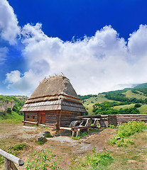 Image showing cabin of poor peasant on picturesque Highlands