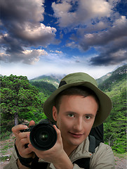 Image showing young tourist with camera