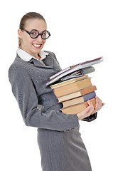 Image showing portrait of a girl with a  stack of books