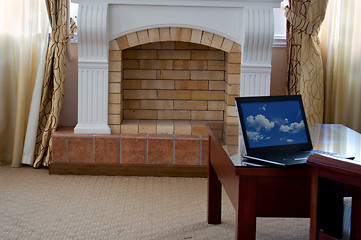 Image showing notebook (laptop) on a  home interior