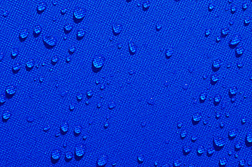 Image showing water drops on blue fabric