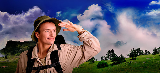 Image showing young man dressed in a tourist 