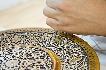 Image showing art of wood carving. 