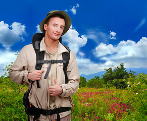 Image showing young man dressed in a tourist 