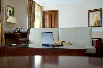 Image showing notebook (laptop) on a  home interior