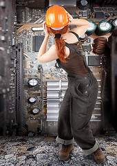 Image showing red-haired worker girl 