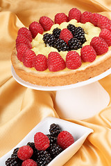 Image showing Custard tart with raspberries and blackberries