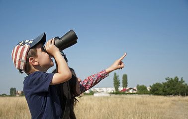Image showing Little boy Binoculars