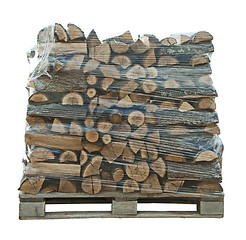 Image showing Packaged stack of freshly cut trees 