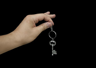 Image showing Hand holding key