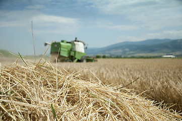 Image showing Tractor and combine harvested 