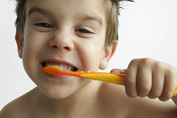 Image showing Boy washing teeth 