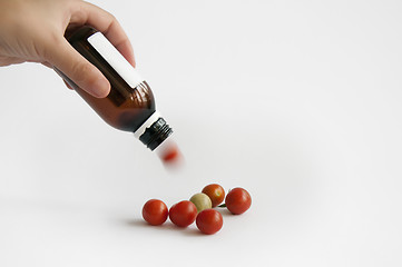 Image showing Tomatoes from the medication bottle