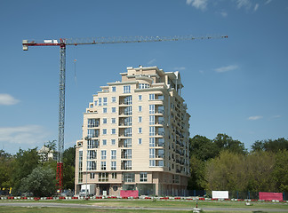 Image showing Construction crane and a new building