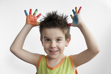Image showing Children colored hands. Little boy hands.