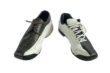 Image showing Sports and dress shoes. 