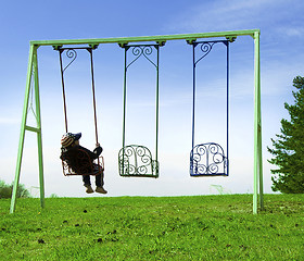 Image showing Boy on swing