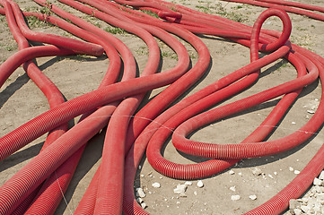 Image showing Red braided and turned tubes