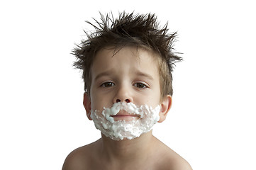 Image showing A little boy shaving