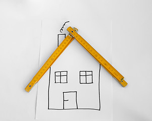 Image showing Drawed house and wooden meter 