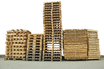 Image showing Stacks of New wooden pallets