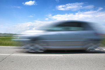 Image showing High speed blurred car
