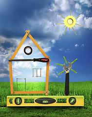 Image showing House with tree and sun made of tools for building.White isolate