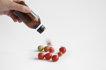 Image showing Tomatoes from the medication bottle