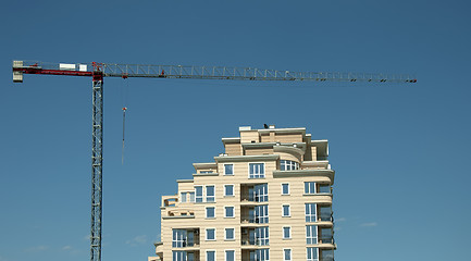 Image showing Construction crane and a new building