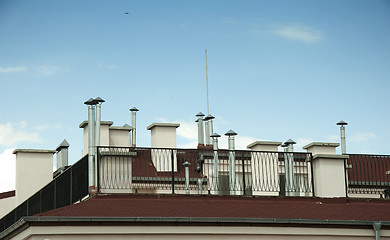 Image showing Many Chimneys on rooftop