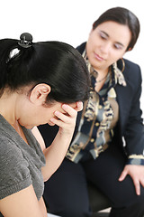 Image showing young woman in a conversation with a consultant or psychologist 