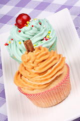 Image showing Two fancy cupcakes