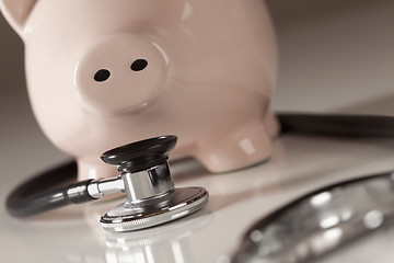 Image showing Piggy Bank and Stethoscope with Selective Focus
