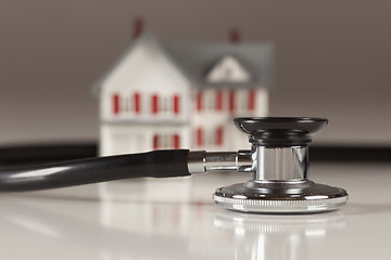 Image showing Stethoscope with Small Model Home