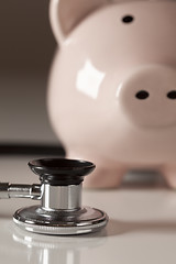 Image showing Piggy Bank and Stethoscope with Selective Focus