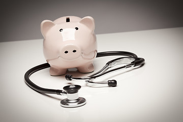 Image showing Piggy Bank and Stethoscope with Selective Focus