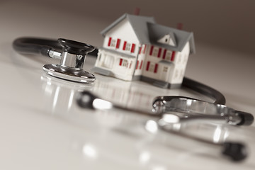 Image showing Stethoscope with Small Model Home